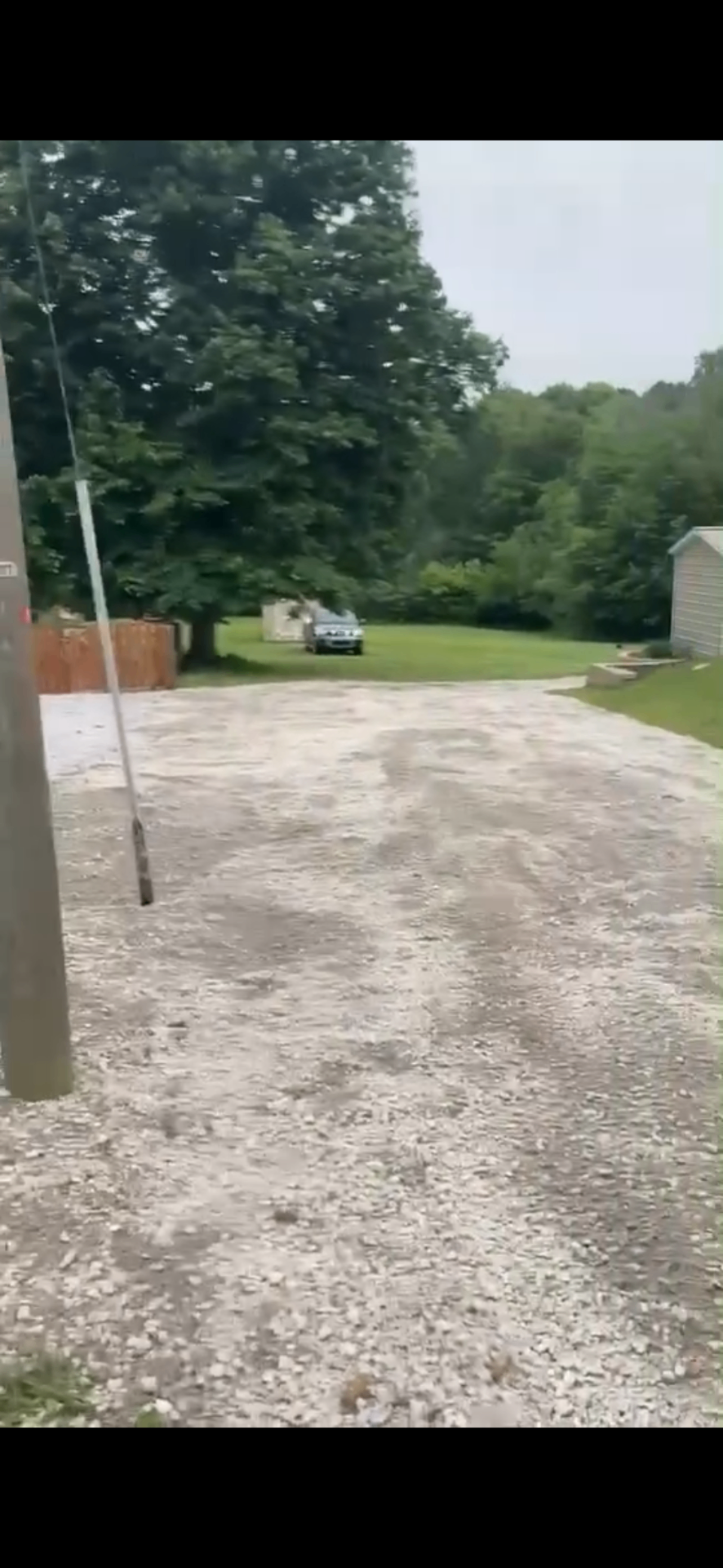 Wide fresh gravel driveway install