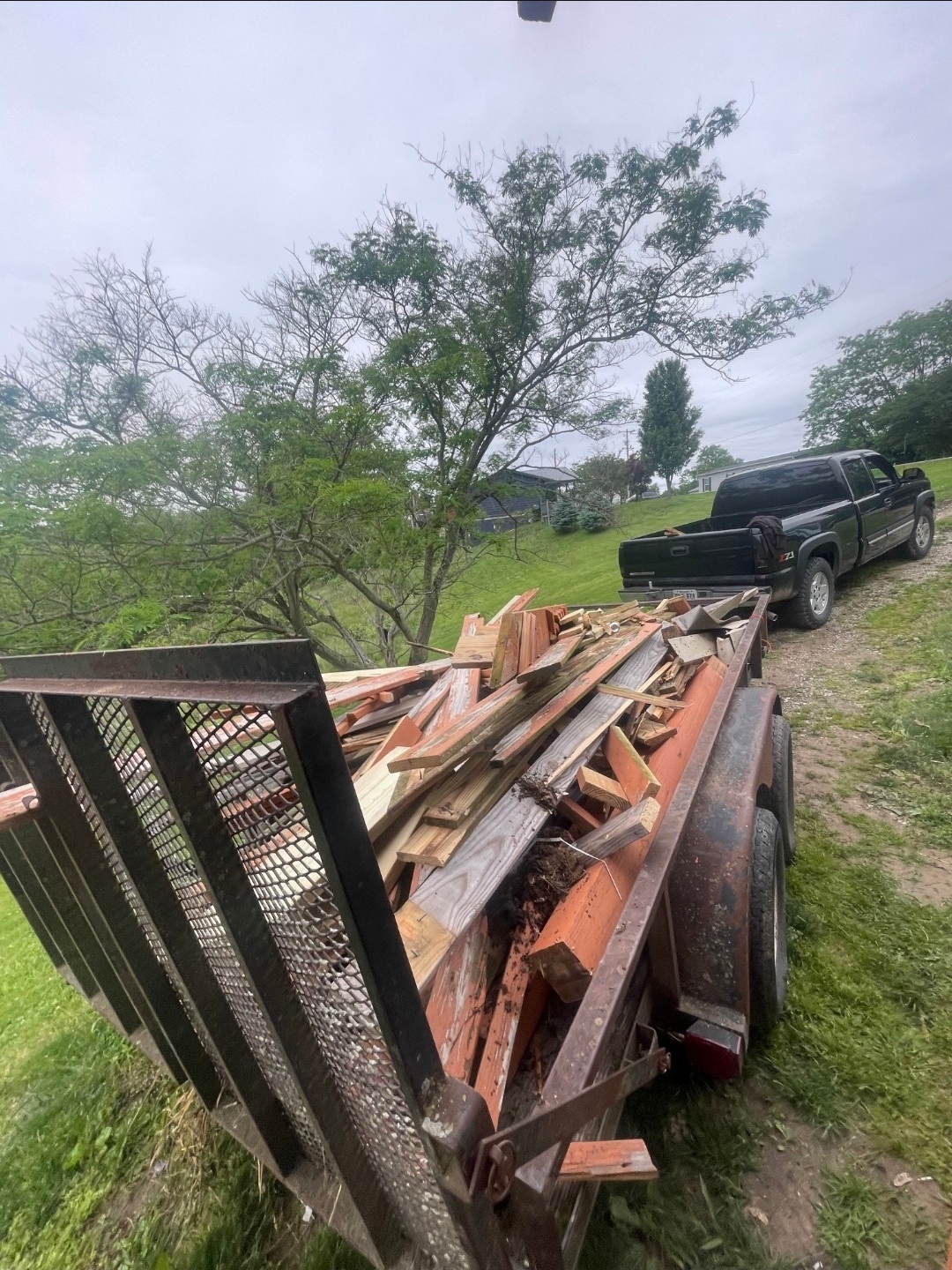 Trailer loaded with demo debris for hauling